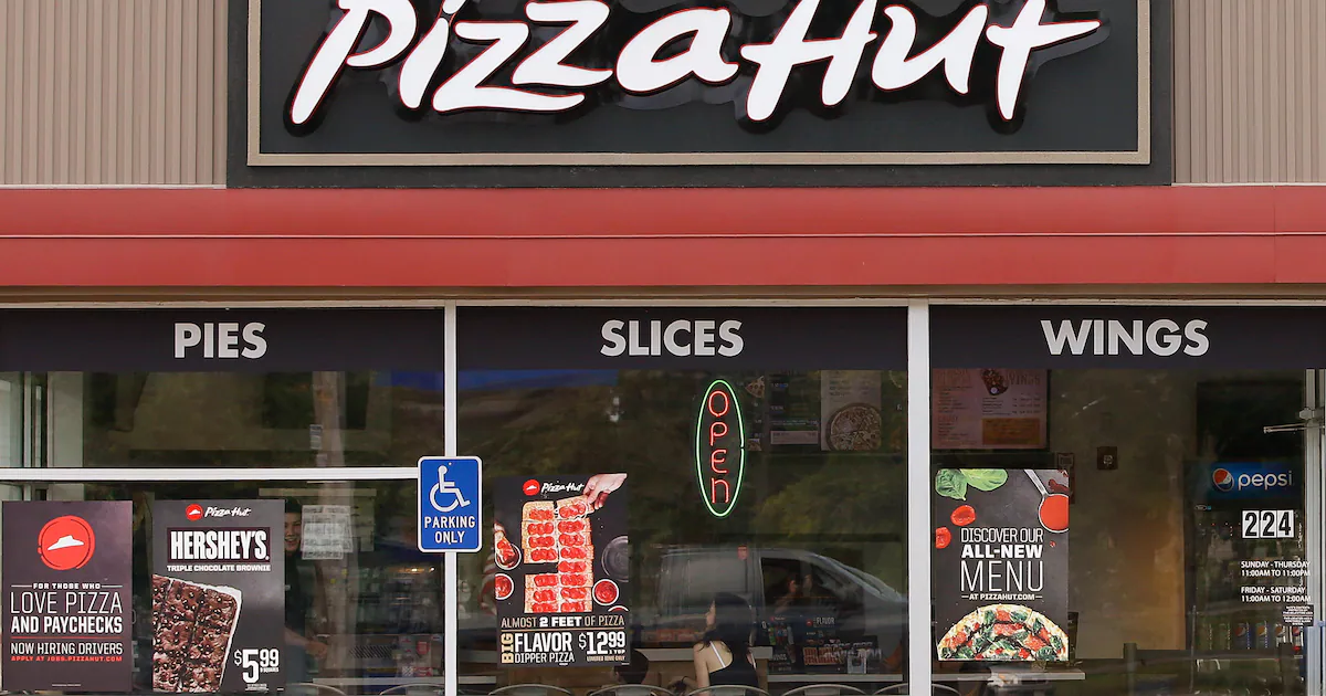 Pizza Hut’s parent company says it’s considering selling the restaurant chain