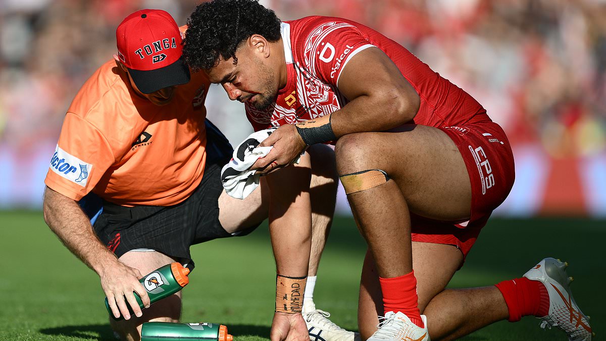 Family of footy star who underwent emergency brain surgery after suffering three head knocks on the pitch provide crucial update on his condition