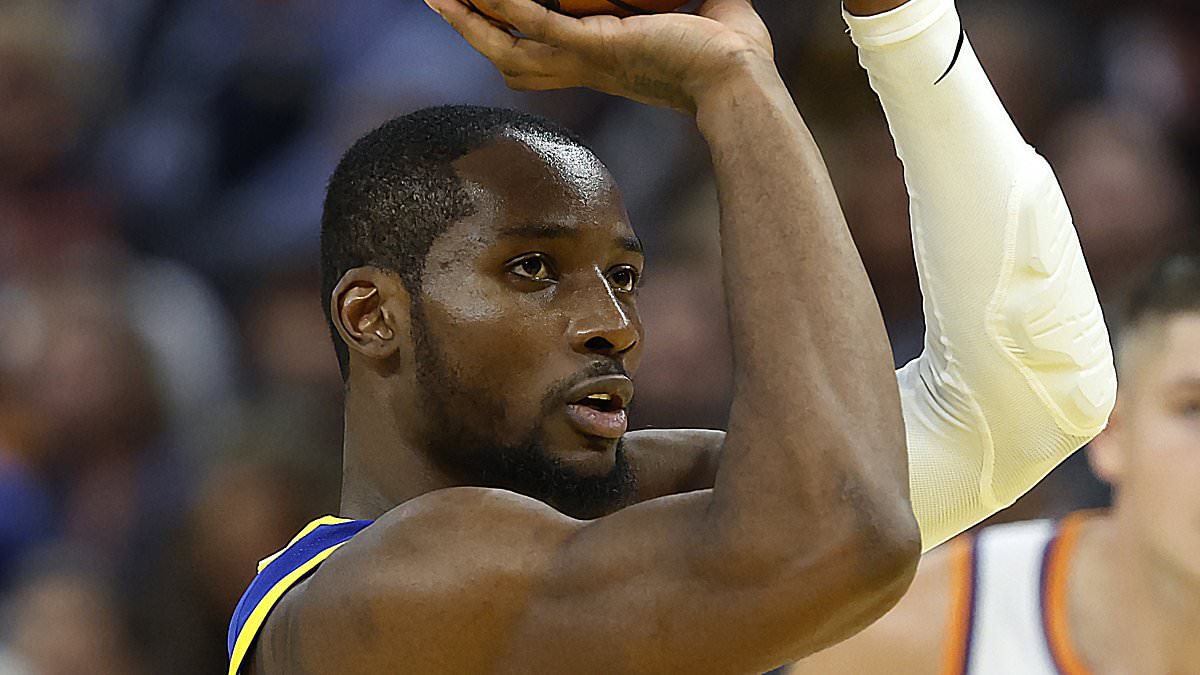 Awkward moment NBA star crashes into the crowd... and inadvertently lands on the team's billionaire owner