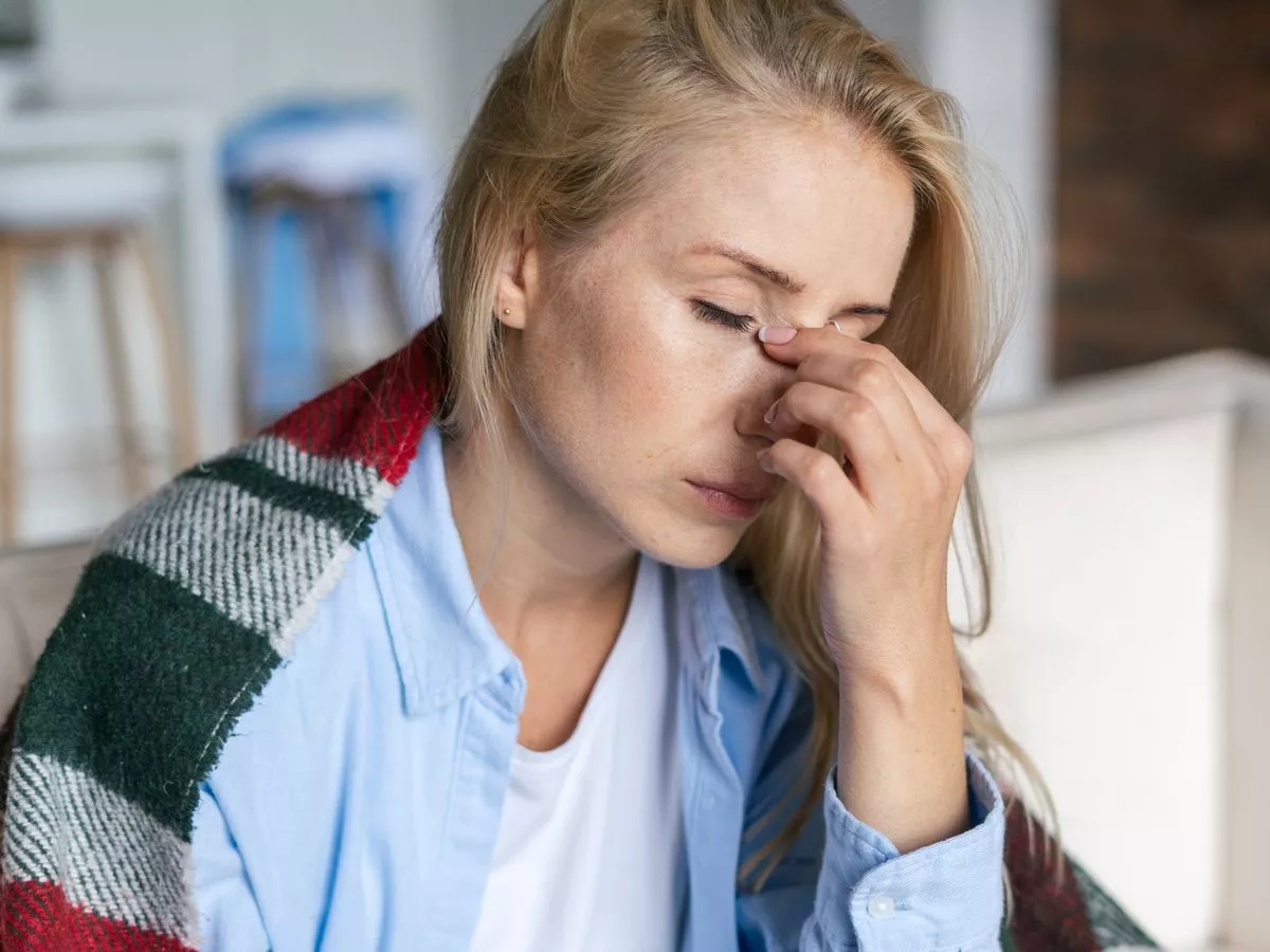 Key symptom that means you have flu and not a cold as NHS warns of 'concerning rise'