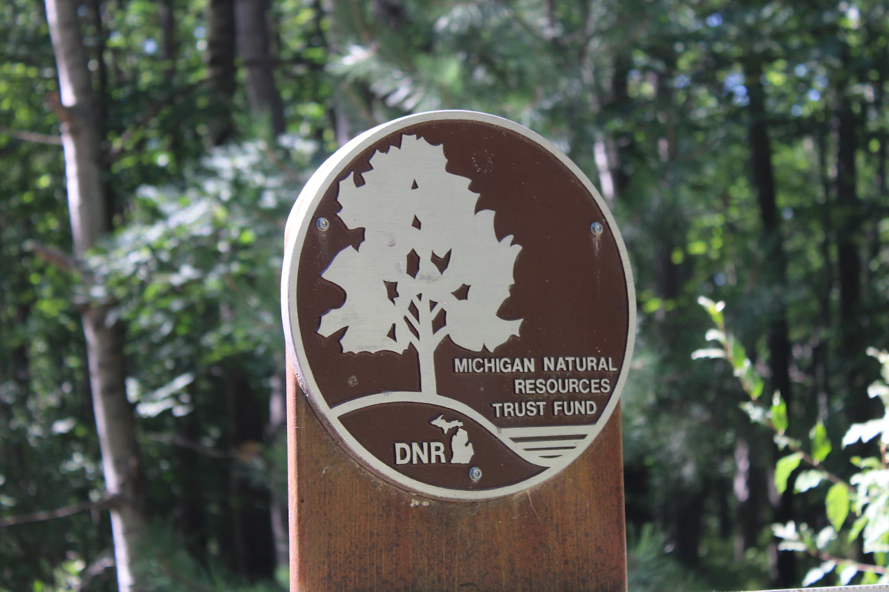 Whitmer signs $41.8M conservation bill, renews environmental fees