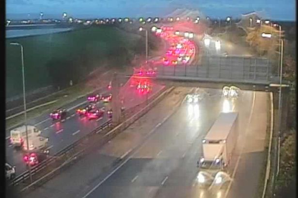 M60 traffic LIVE updates as queues build up following crash