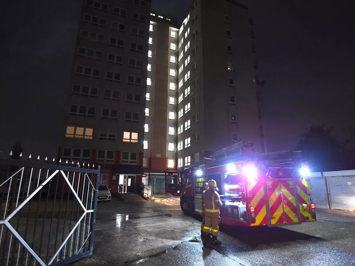 Emergency crews pelted with fireworks while racing to blaze at high-rise block