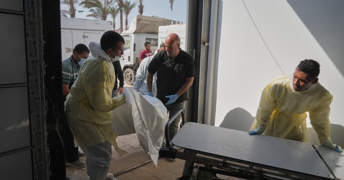 Israel returns bodies of 15 Palestinians to Gaza as exchanges in fragile ceasefire continue