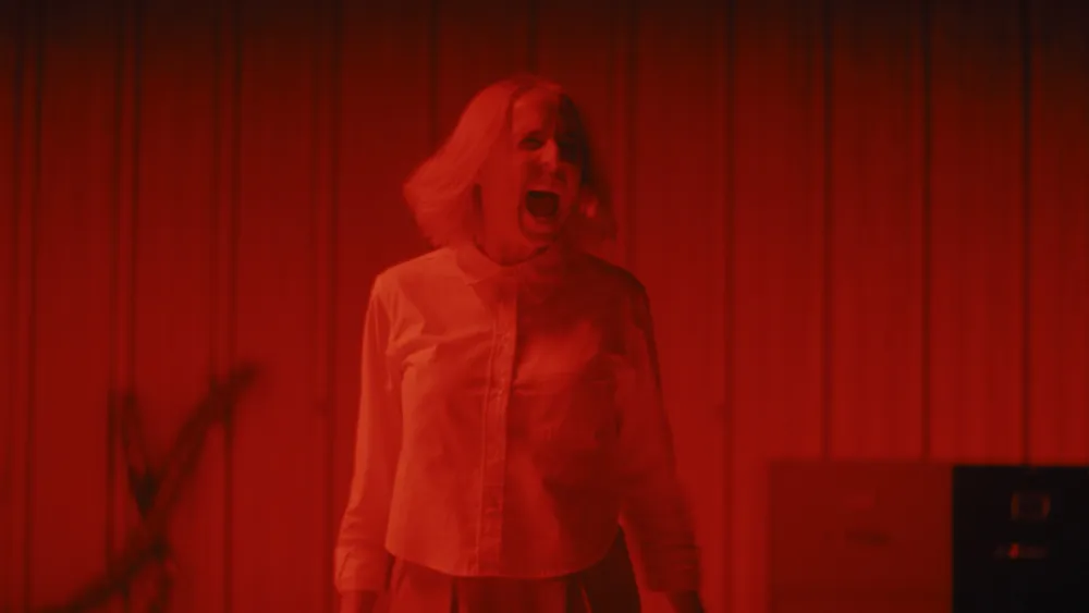 A Bloody Horror Movie Satirizing Grind Culture