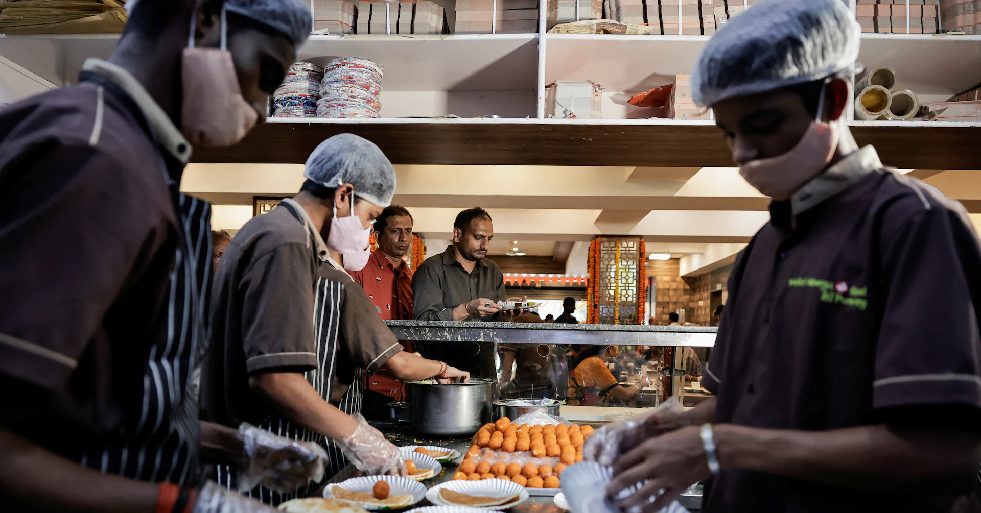 India's October services growth eases to five-month low on heavy rain, competition, PMI shows