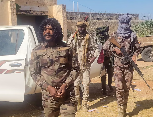 Moment ‘psychopathic’ soldier who filmed war crimes in Sudan arrested