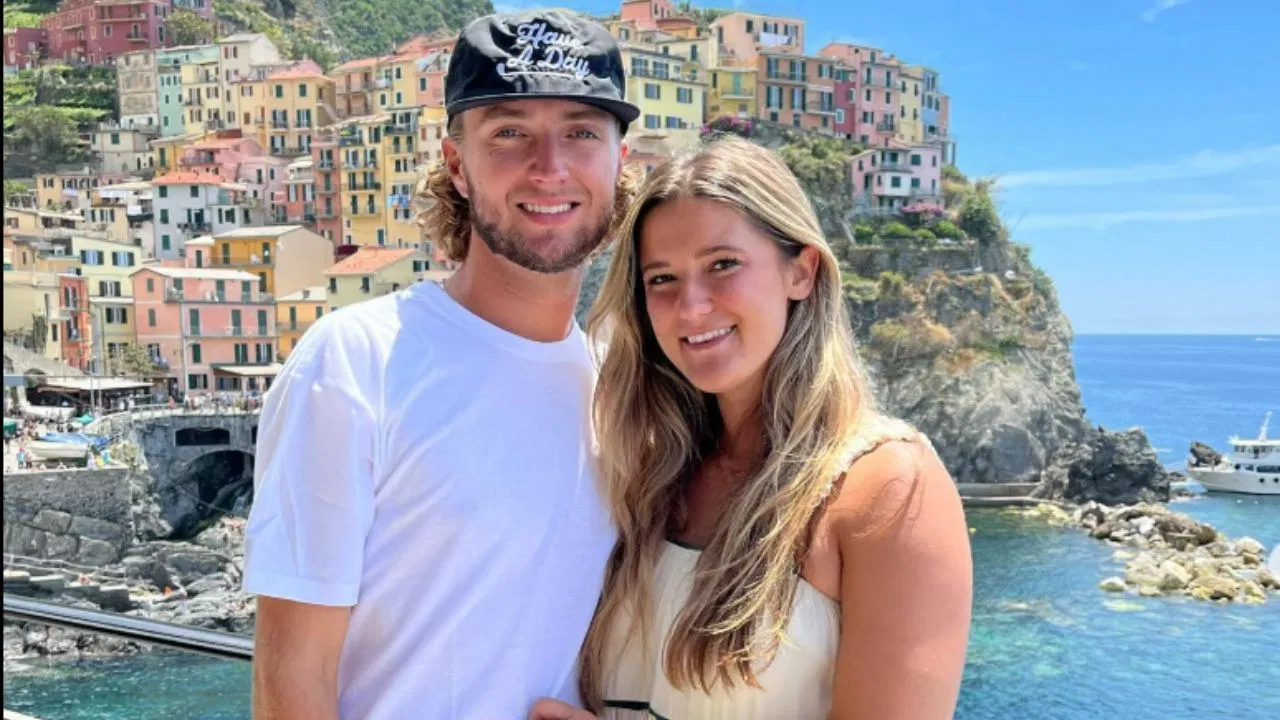 Late Blue Jays legend Roy Halladay's son Braden pops the big question to girlfriend Emma Grace in a dreamy seaside moment