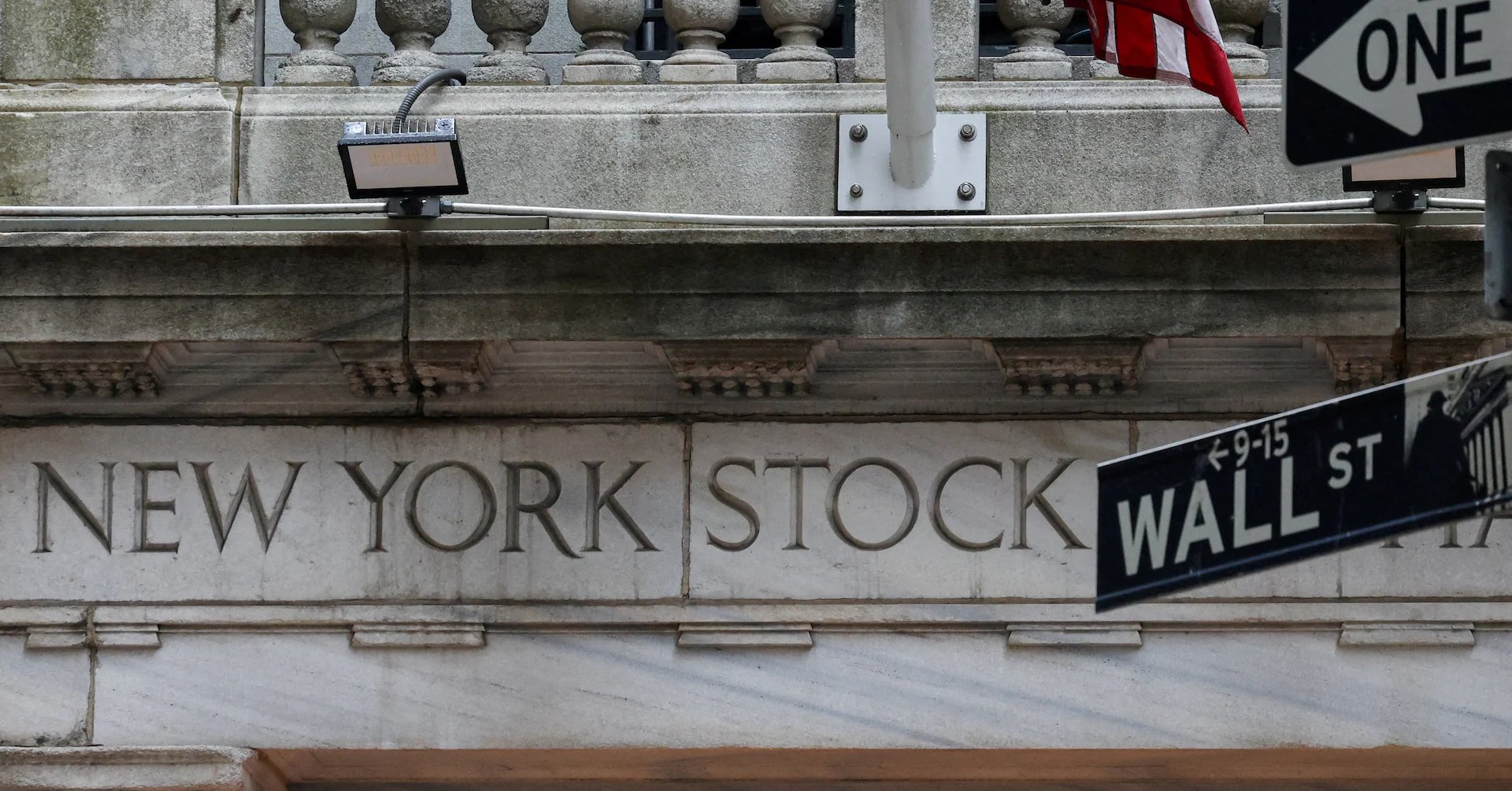 AMERICAS Selloff abates as economy hums, layoffs rise