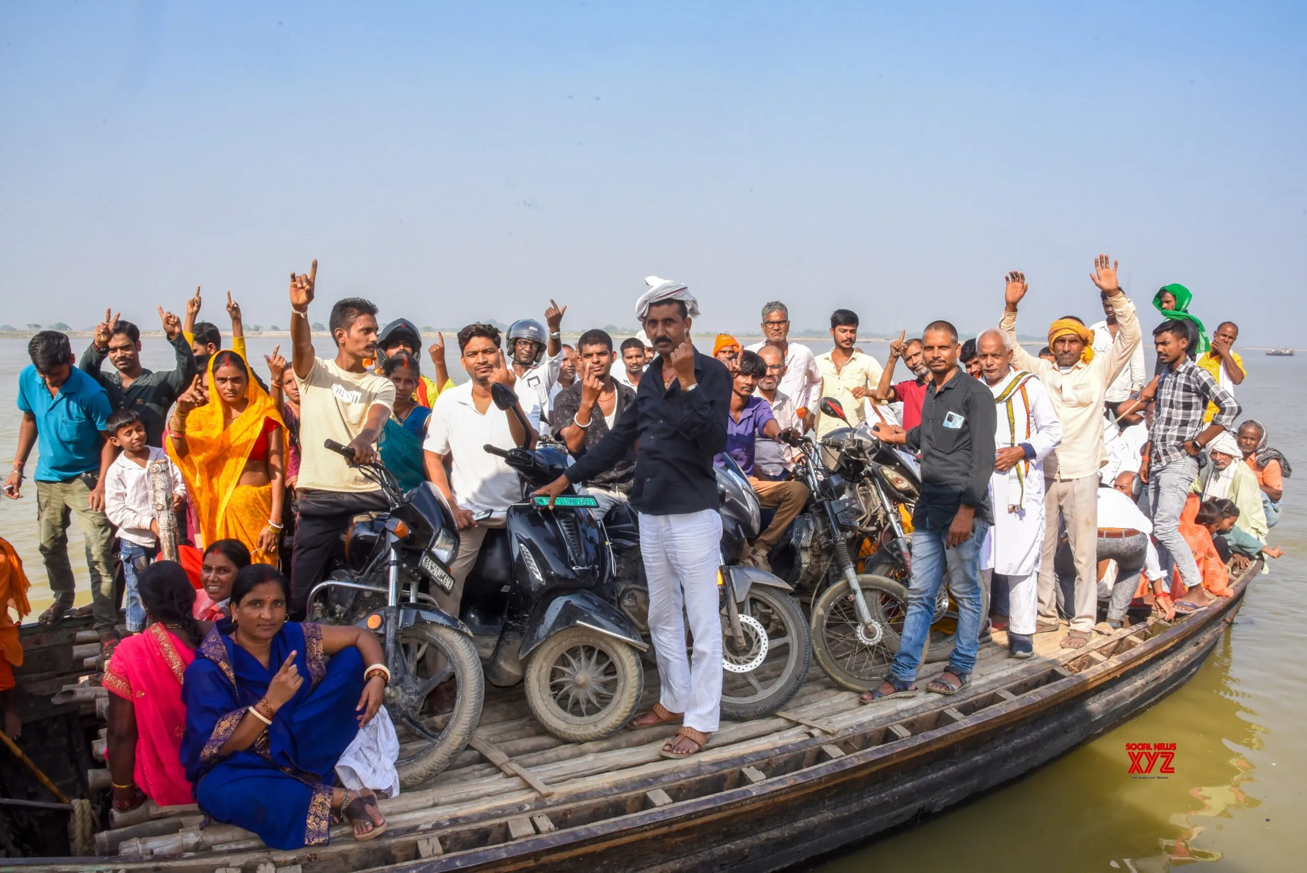 Patna: Voters Travel by Boat in Danapur #Gallery
