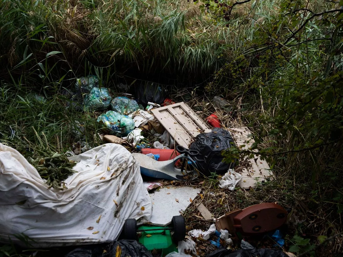 Fury as ‘absolutely disgusting’ fly-tippers toss sofa down hillside