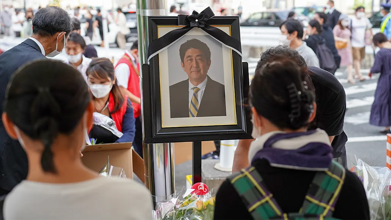 Former Japanese prime minister's accused killer pleads guilty during Trump visit