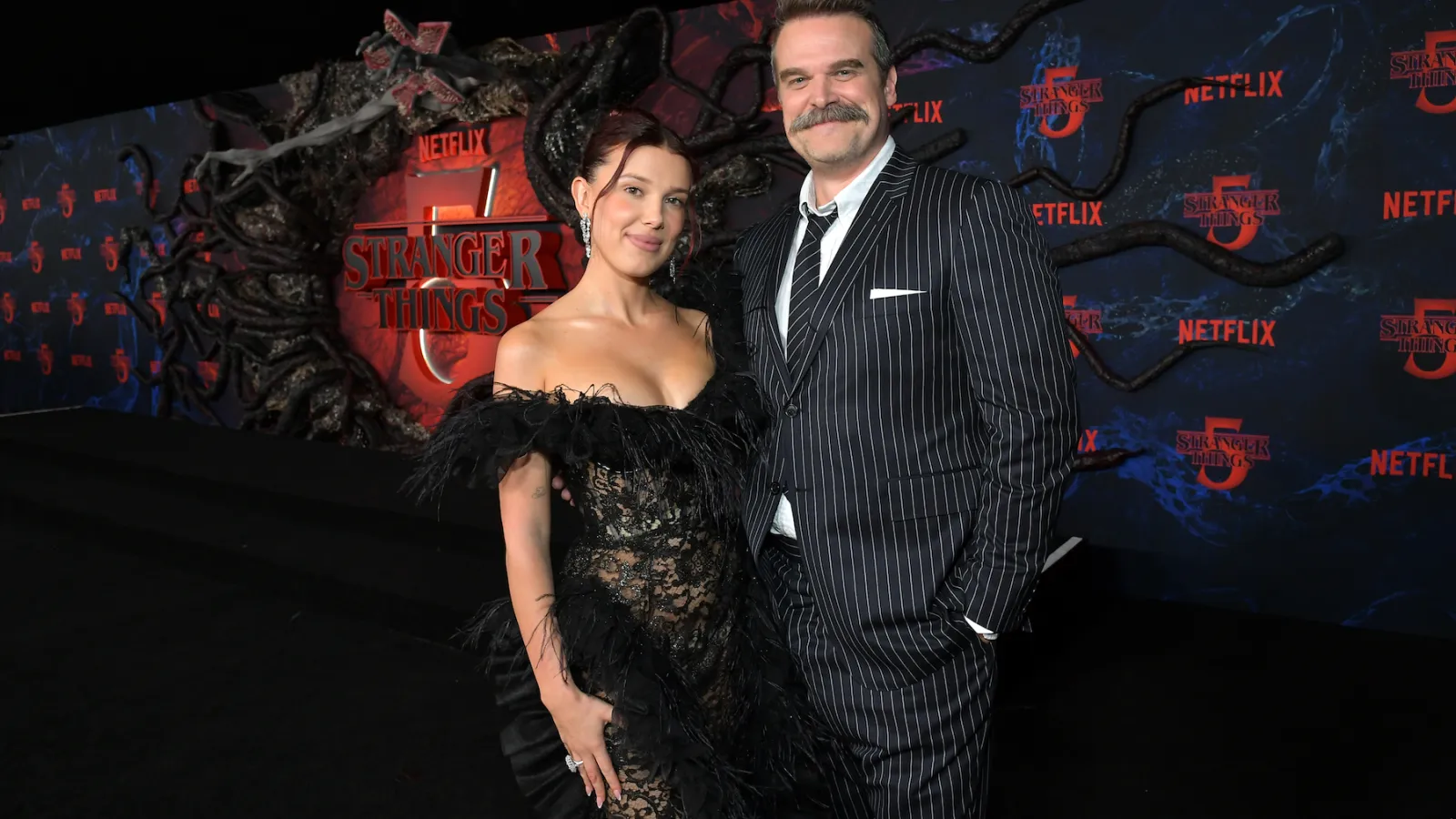 Millie Bobby Brown, David Harbour Reunite at Stranger Things Premiere