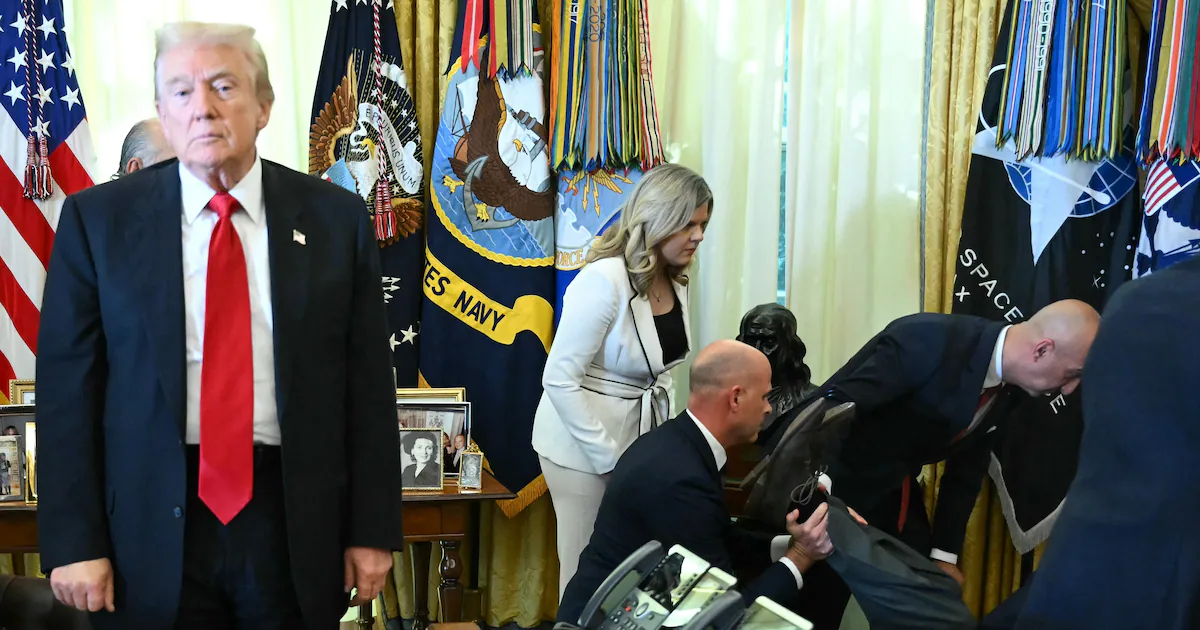 Trump Freezes as Man Collapses Right Behind Him in Oval Office
