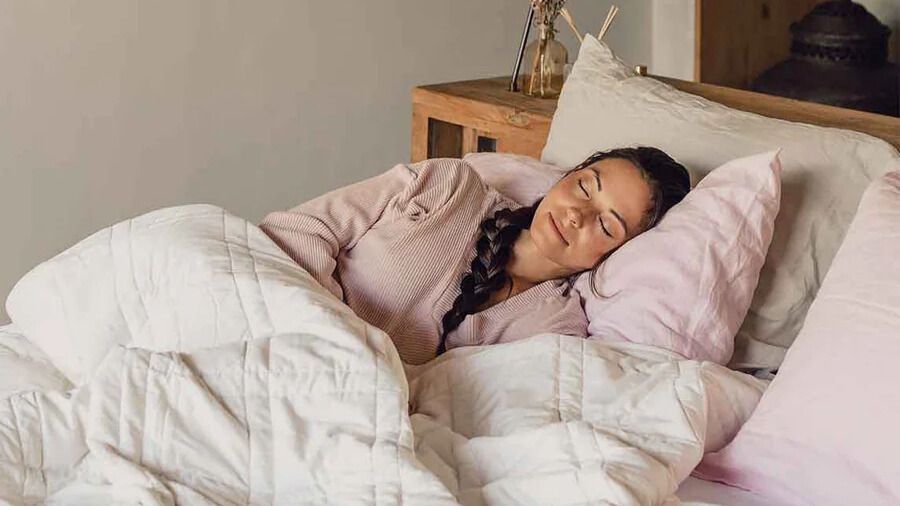 I tried a weighted blanket for the first time this fall — and have finally cracked the code to achieve cozy, restful sleep
