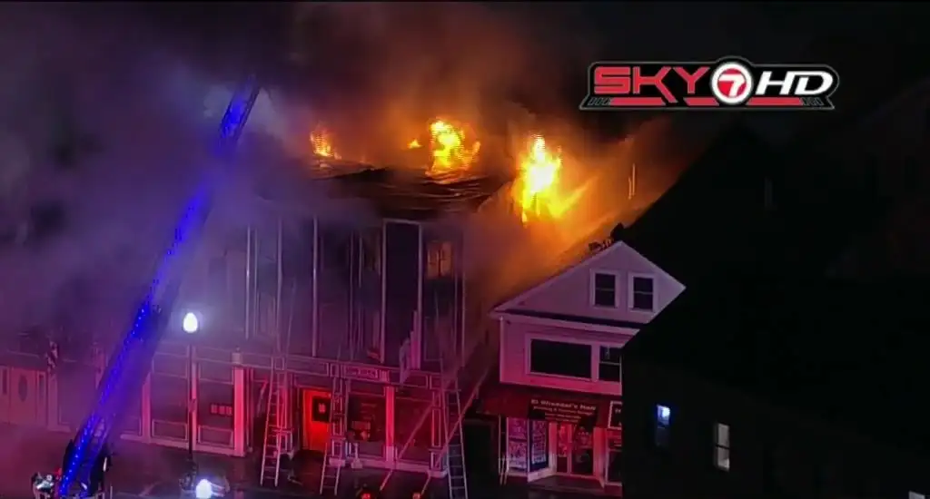 Large fire burning at business in Milford