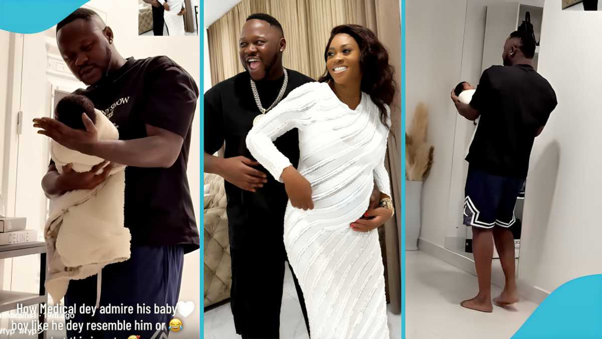 Medikal displays his fatherly duties with his new baby, Space Frimpong