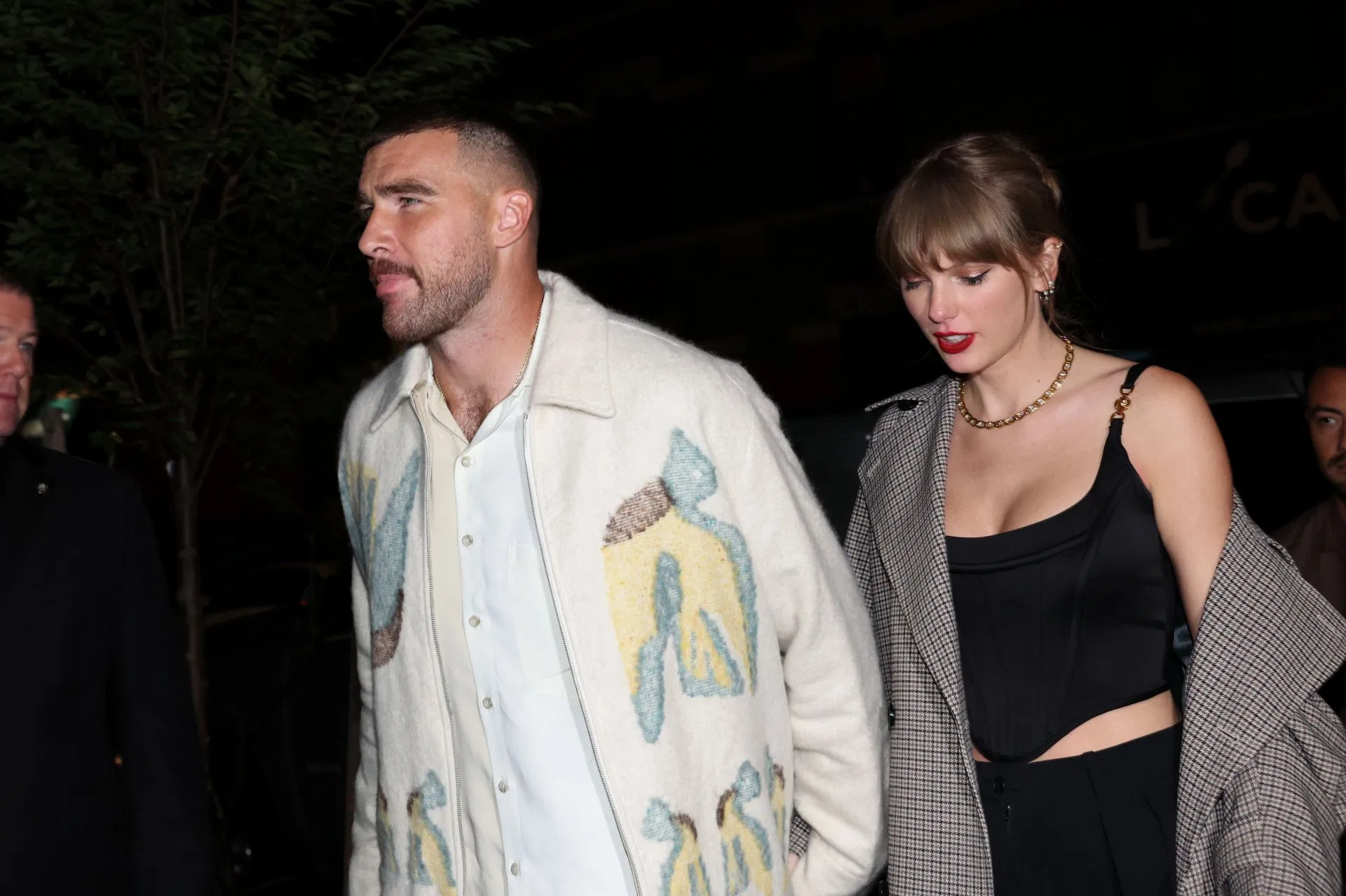 Travis Kelce and Taylor Swift hold hands recreating 2-year-old viral picture while twinning in black for romantic NY date night