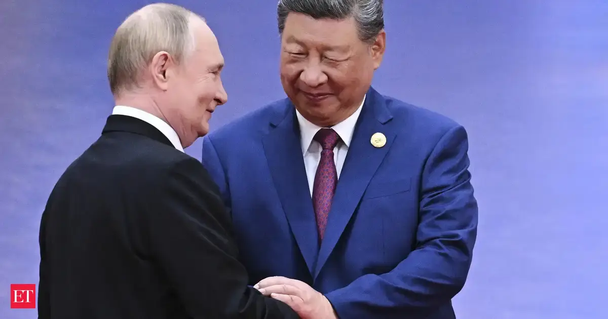 China, Russia vow joint response to 'unilateral' sanctions during Russian PM visit