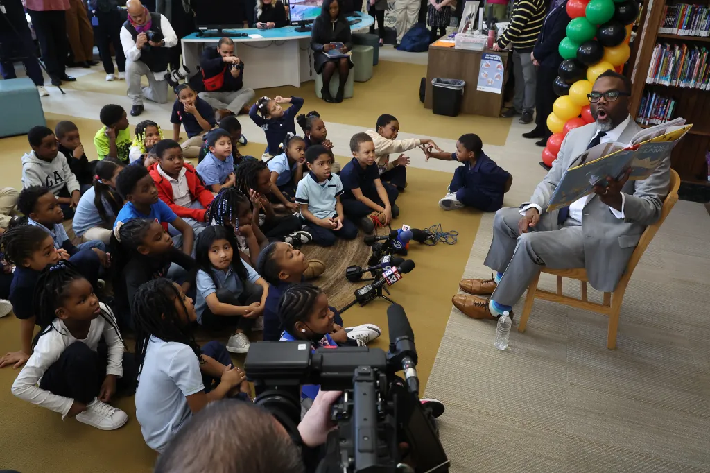 Why is Chicago cutting its library budget?