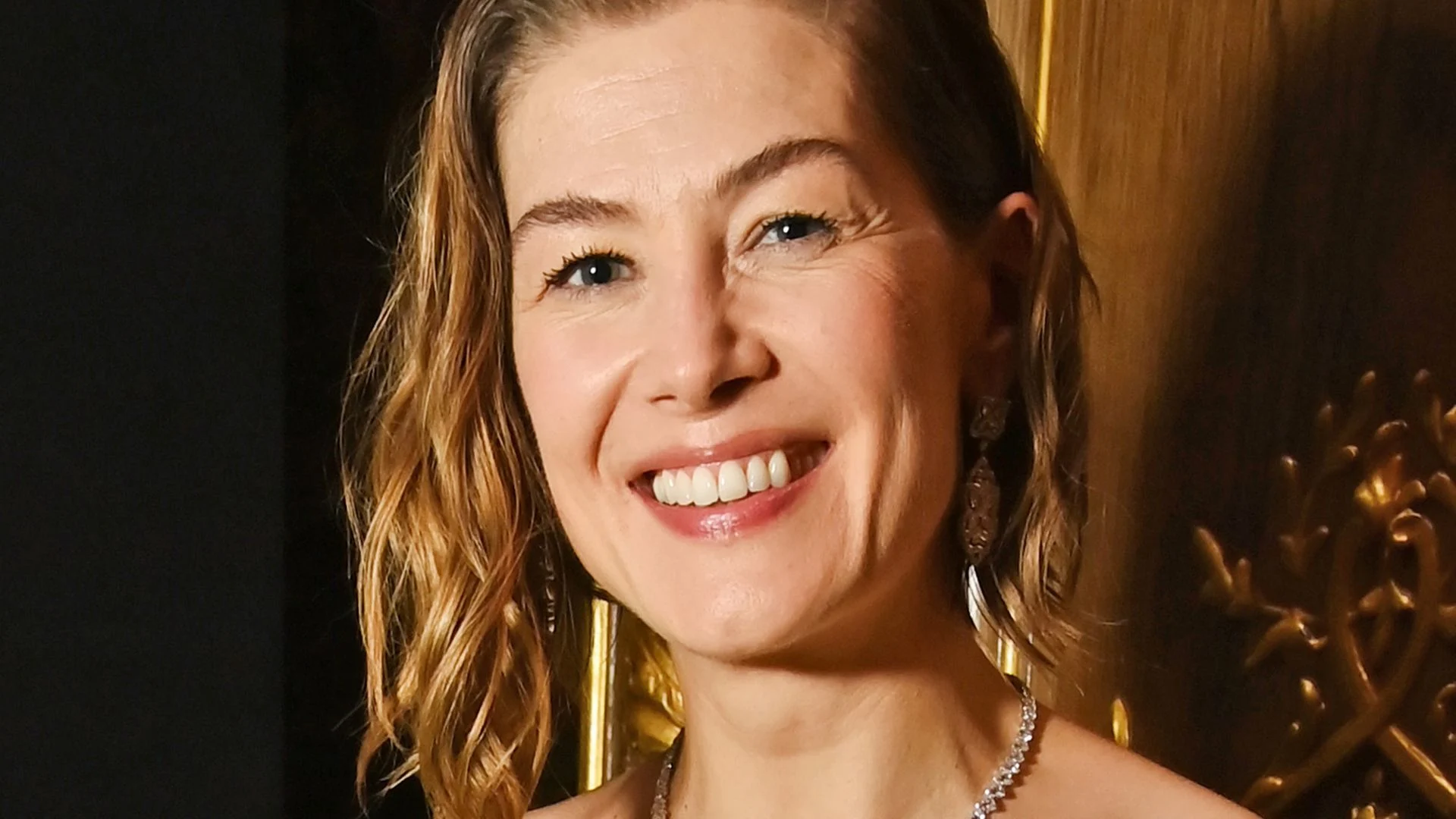 Meet Rosamund Pike's businessman boyfriend - and why they haven't married