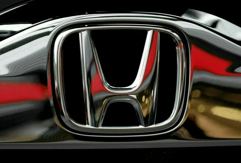 Honda cuts annual operating profit after posting Q2 drop