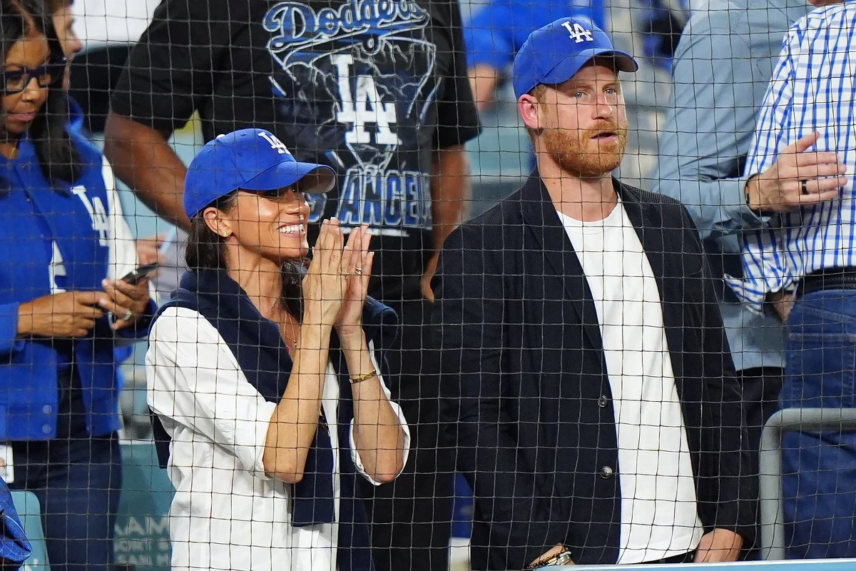 Harry and Meghan cheer on the Los Angeles Dodgers from front row seats
