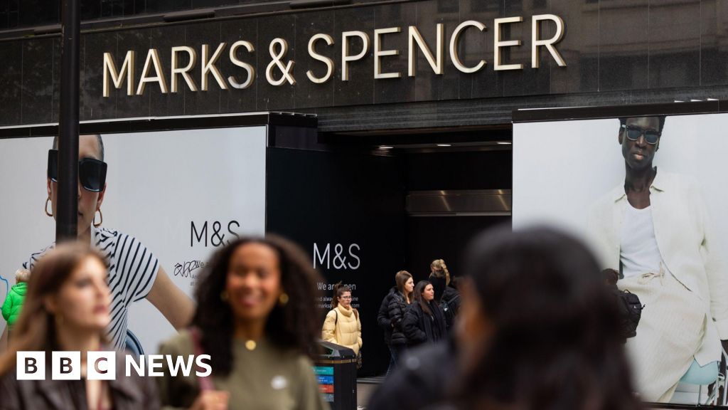 M&S profits halved after cyber-attack
