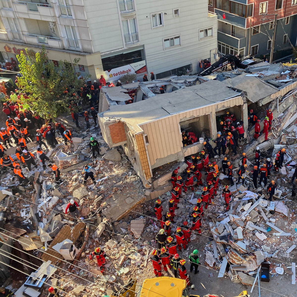 Turkey building collapse kills two and traps three others under rubble