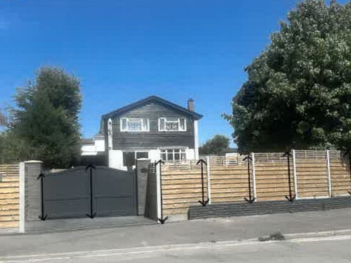 Family ordered to take down 'unacceptable' garden fence despite support from locals