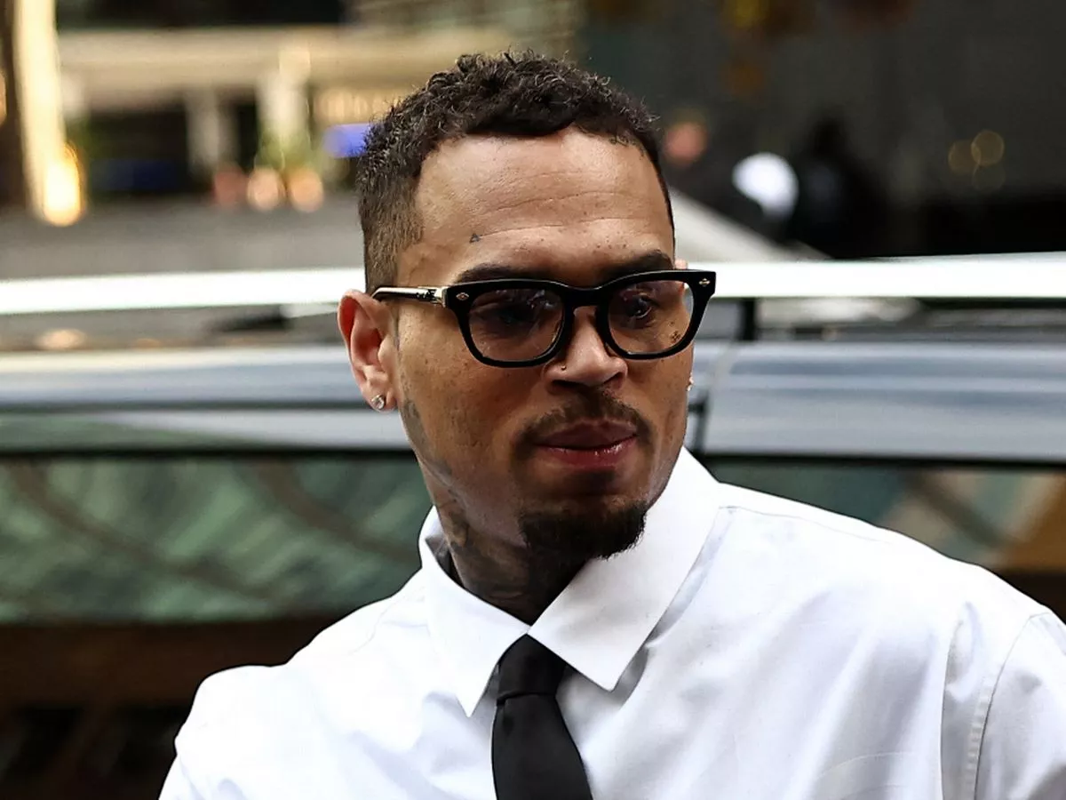 Chris Brown 'racks up six-figure booze bill' during wild night out ahead of trial