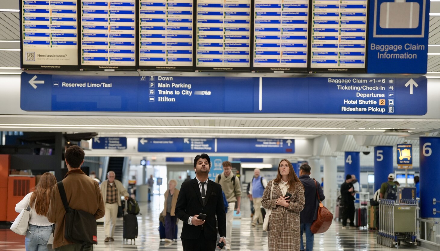 Travelers at O'Hare frustrated by last-minute cancellations as FAA cuts flights amid government shutdown
