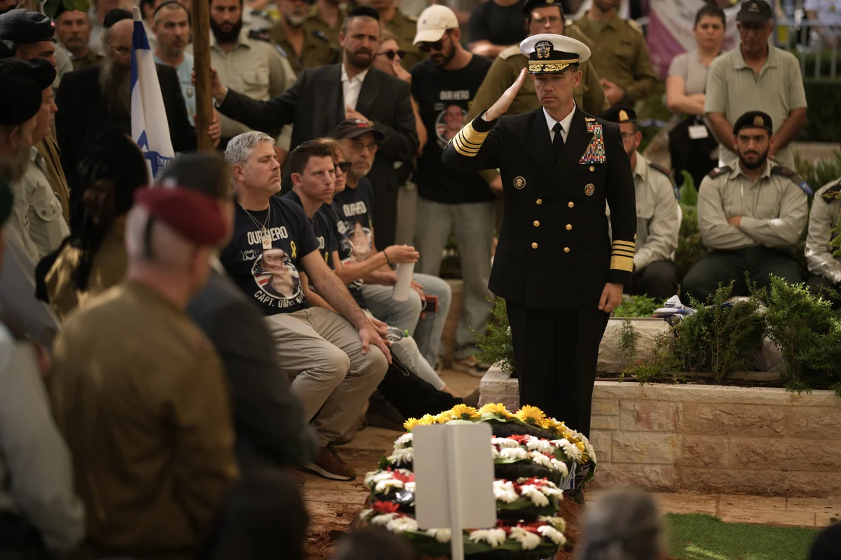 Hundreds of mourners attend funeral of returned Hamas hostage Capt. Omer Neutra