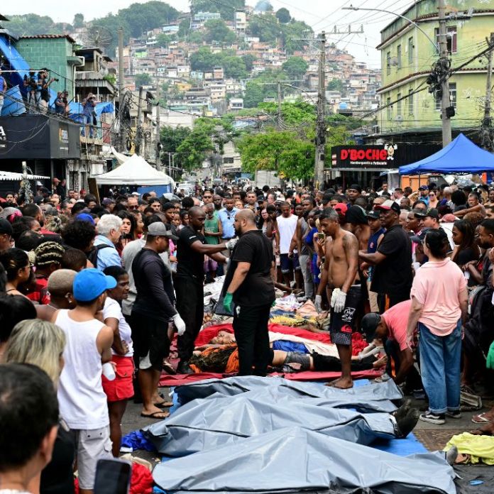 Locals line up dozens of bodies after deadly police operation in Rio