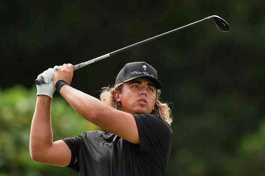 Higgo matches course record, holds lead