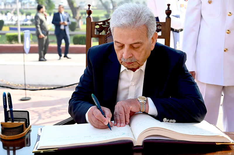 Federal Minister for National Food Security and Research Rana Tanveer Hussain recording his remarks in the visitor’s book after laying floral wreaths to pay homage to the national poet Allama Muhammad Iqbal on his 148th birthday anniversary at Mazar-e-Iqb
