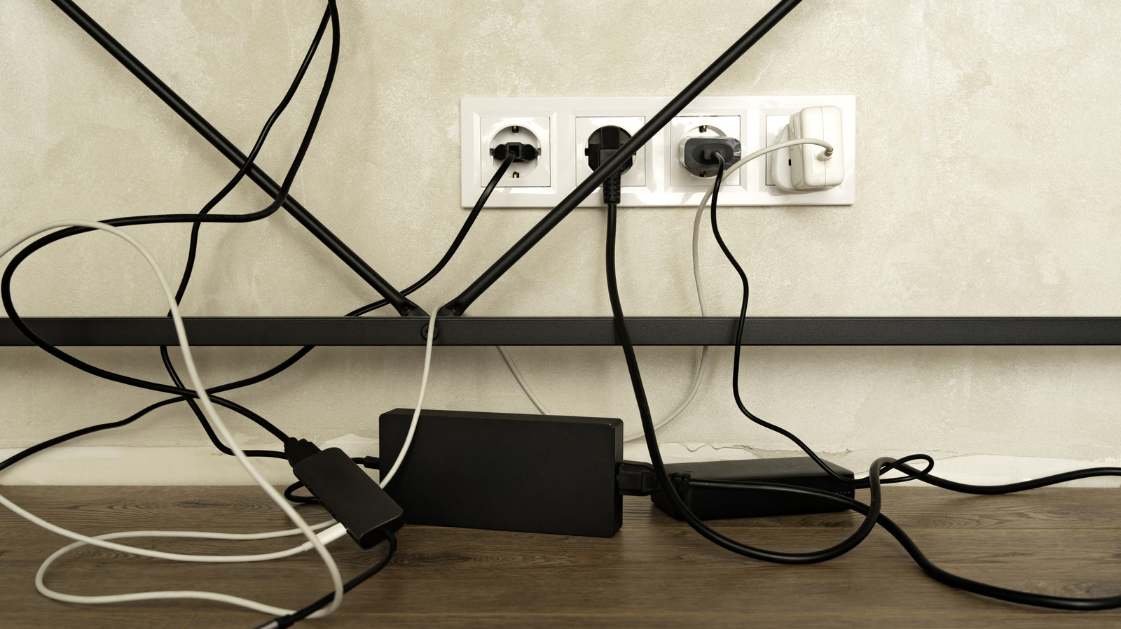 Say Goodbye To The Eyesore Of Cable Clutter With One Sleek Dollar Tree DIY
