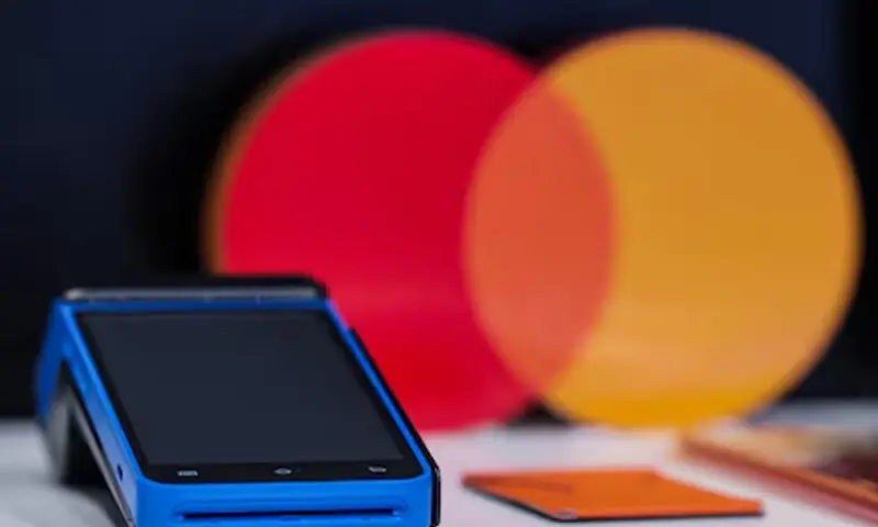 Visa and Mastercard near settlement with merchants, would lower fees, WSJ reports