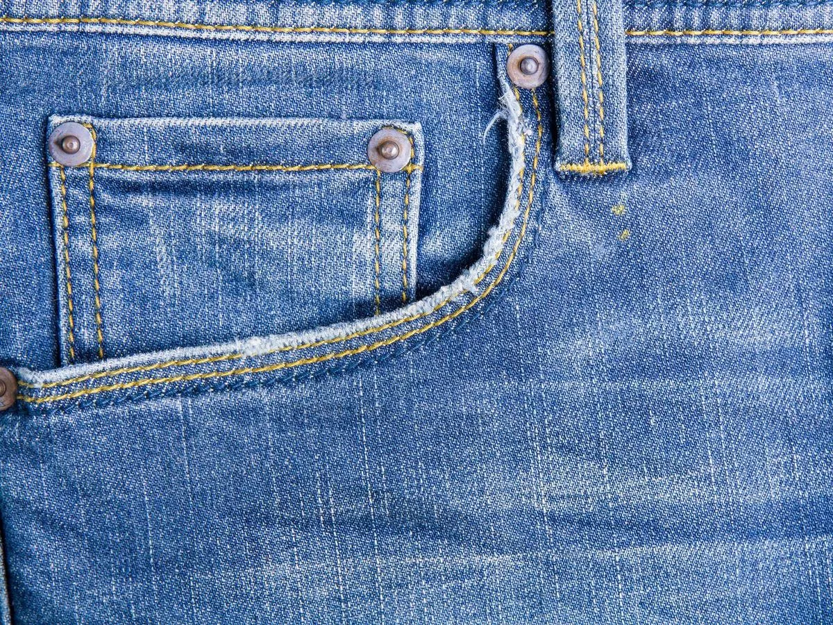 People only just discovering what metal 'buttons' on jean pockets are for