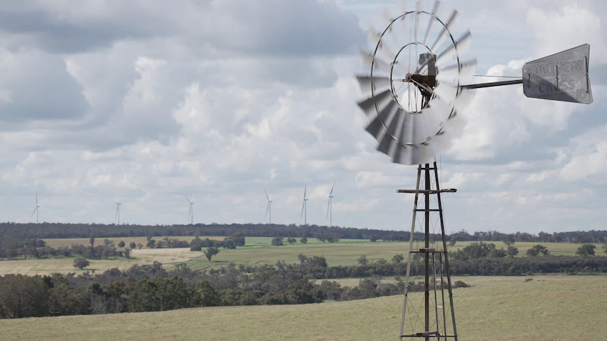 The wind blows, yet turbines lie still. It's a symptom of Australia's renewables glut