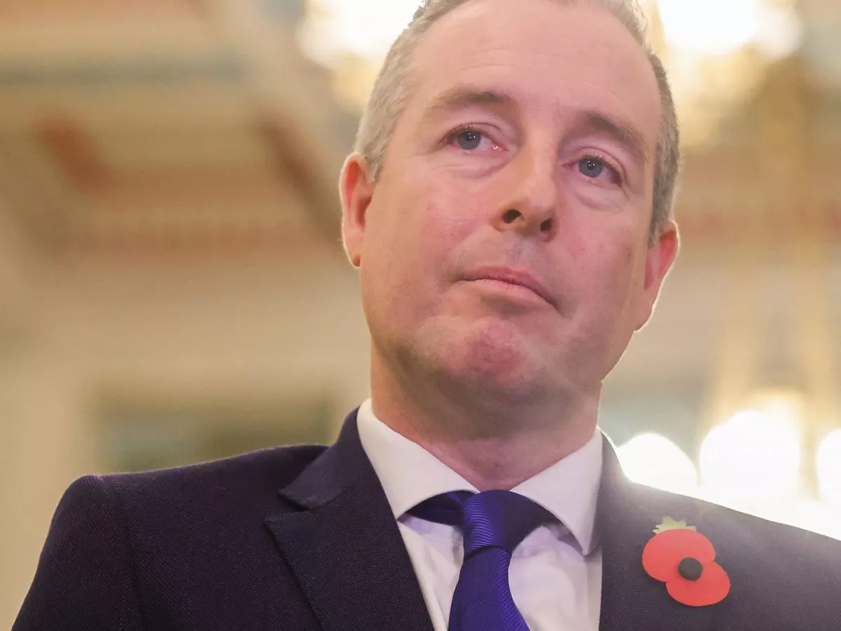 "Shame on you Paul Givan" - Protester thrown out of Stormont public gallery