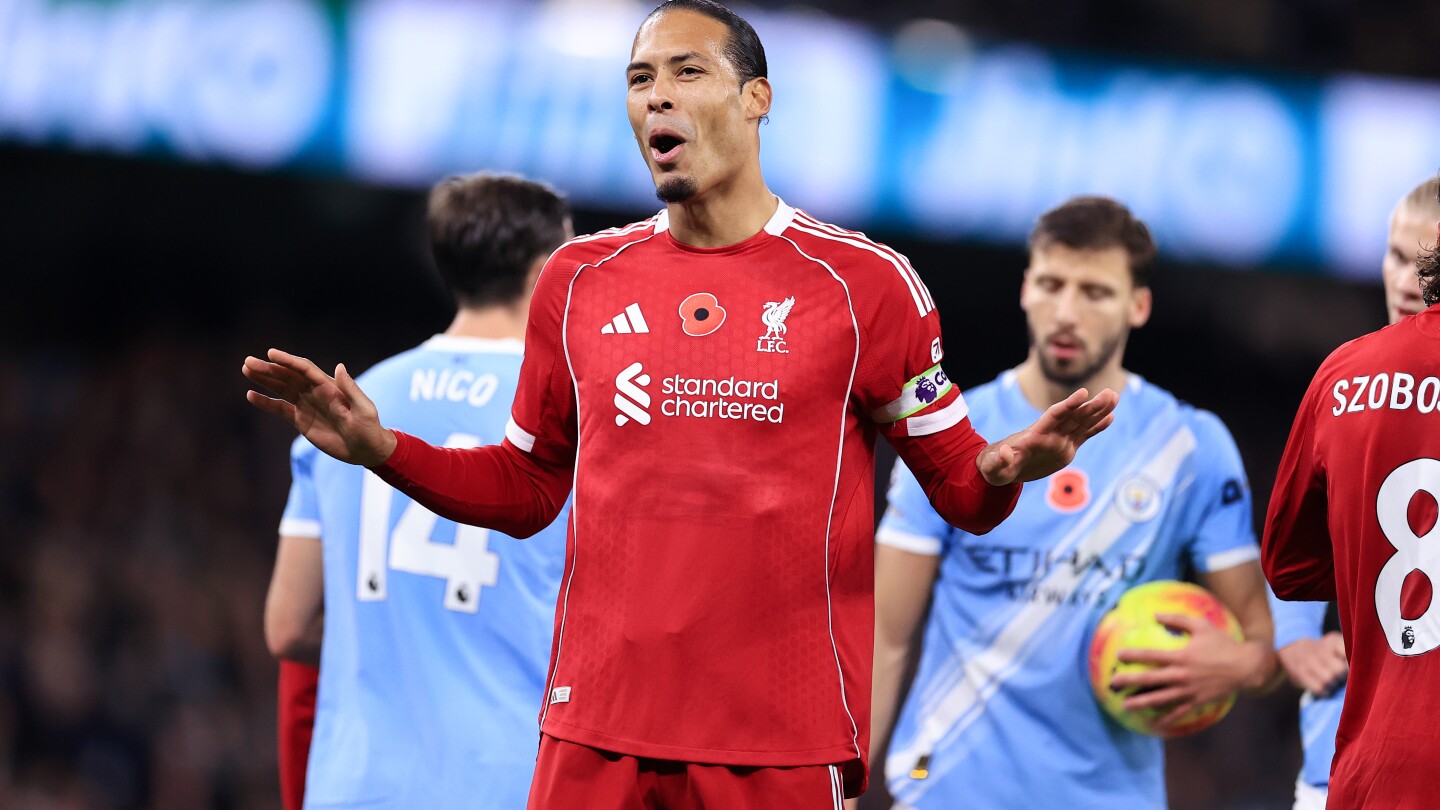 Defiant Virgil van Dijk refuses to give up on Liverpool's Premier League title hopes