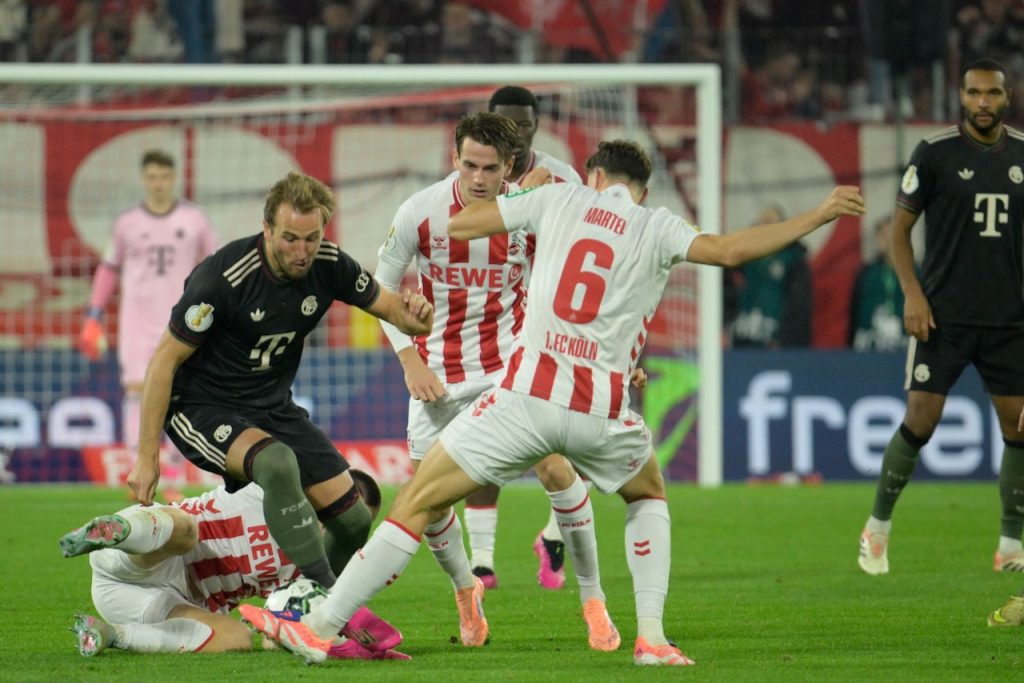 Kane scores twice as Bayern set European wins record