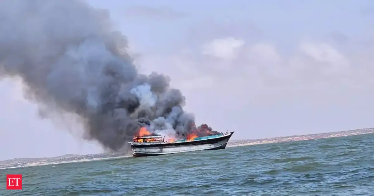 Attackers board ship off the coast of Somalia after firing rocket-propelled grenades at it