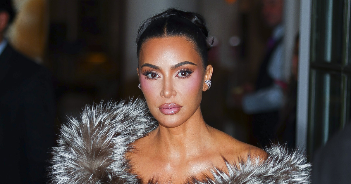 Kim Kardashian Stuns in Bond Girl Look for Kris’s 70th
