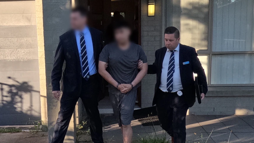 Ex-NAB employee charged over alleged role in $200m bank fraud syndicate