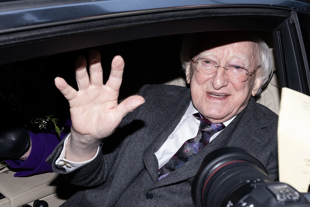 Michael D Higgins and Sabina given roses and cheered as term ends