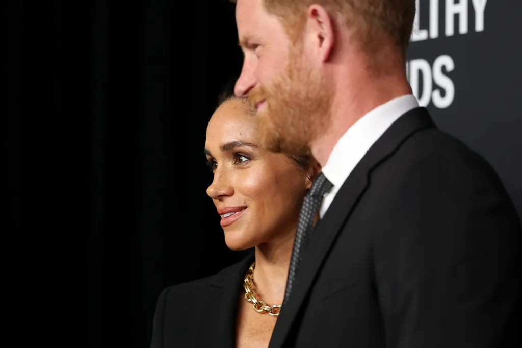 Harry and Meghan cozied up to 'the oligarchy' at Kardashian/Bezos party