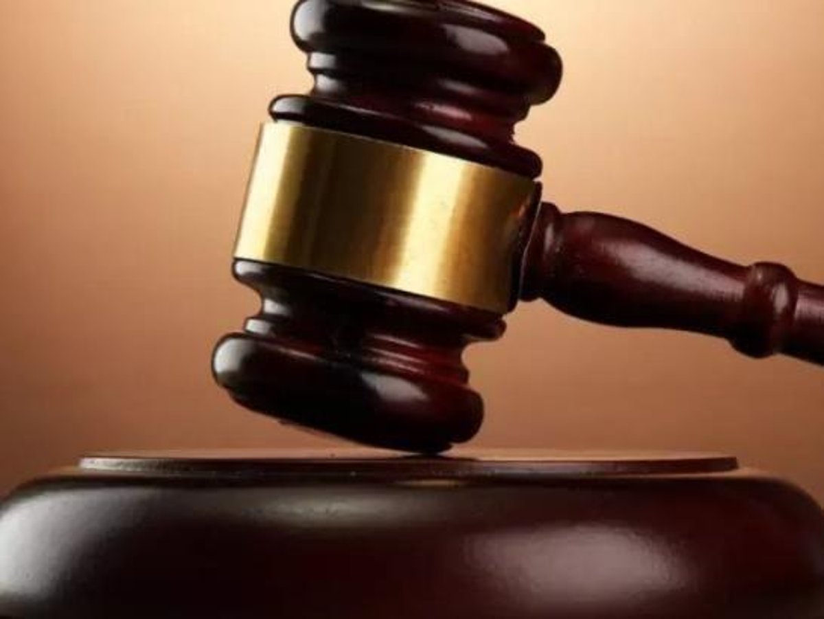 Derry man who spat at ex-partner in her work sentenced