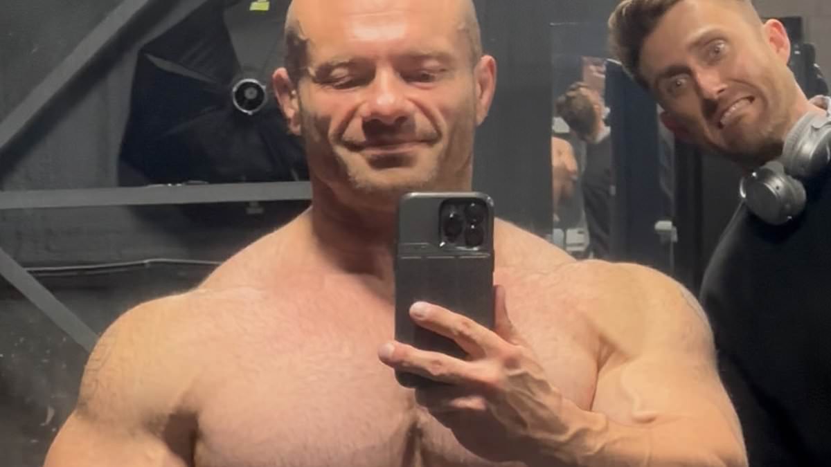 Hidden darkness behind 5ft 6in podcasting powerhouse 'Dr Mike'... the muscle-bound messiah who's become the Pied Piper for men